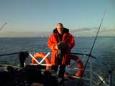 Arjen achter op de boot